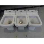 Three soak.com toilet basins.