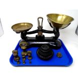 A set of vintage Libra kitchen scales with two sets of graduated weights.