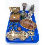 A tray containing plated candlestick, similar dwarf candlestick, sifter,
