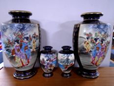 Two pairs of Japanese Satsuma vases (height 31.5cm and 15 cm).