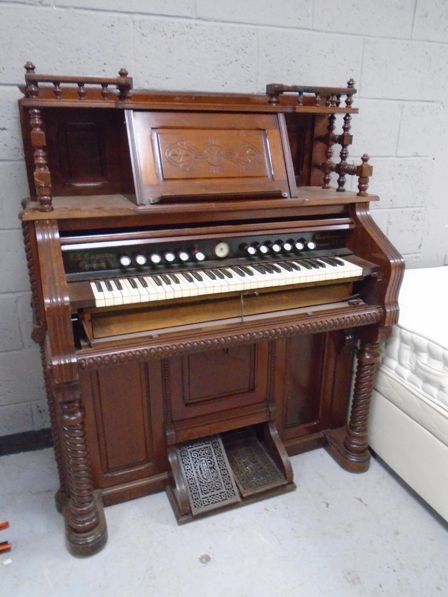 A 19th century American mahogany cased organ by E. P. Carpenter & Co.