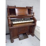 A 19th century American mahogany cased organ by E. P. Carpenter & Co.