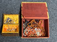 A fabric jewellery box containing assorted costume jewellery, wristwatch,
