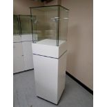 A jeweller's glass display cabinet on stand with keys.