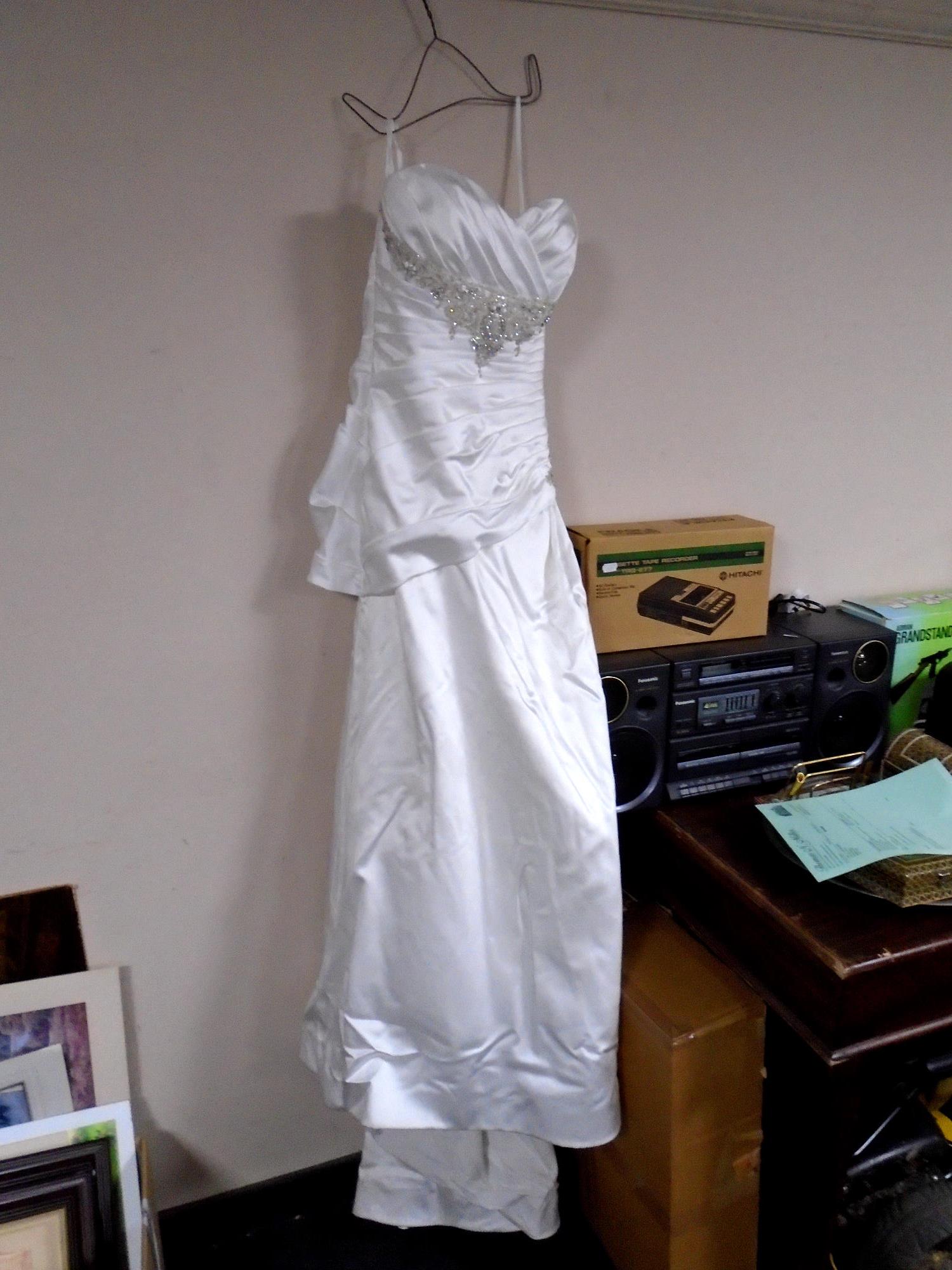 A Jade Daniels wedding dress with underskirt.
