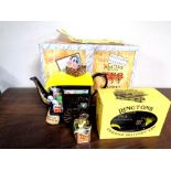 A Ringtons delivery wagon teapot (boxed) together with a further boxed Ringtons delivery van with