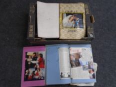A box containing a quantity of scrap books and other books related to Royalty and other topics.