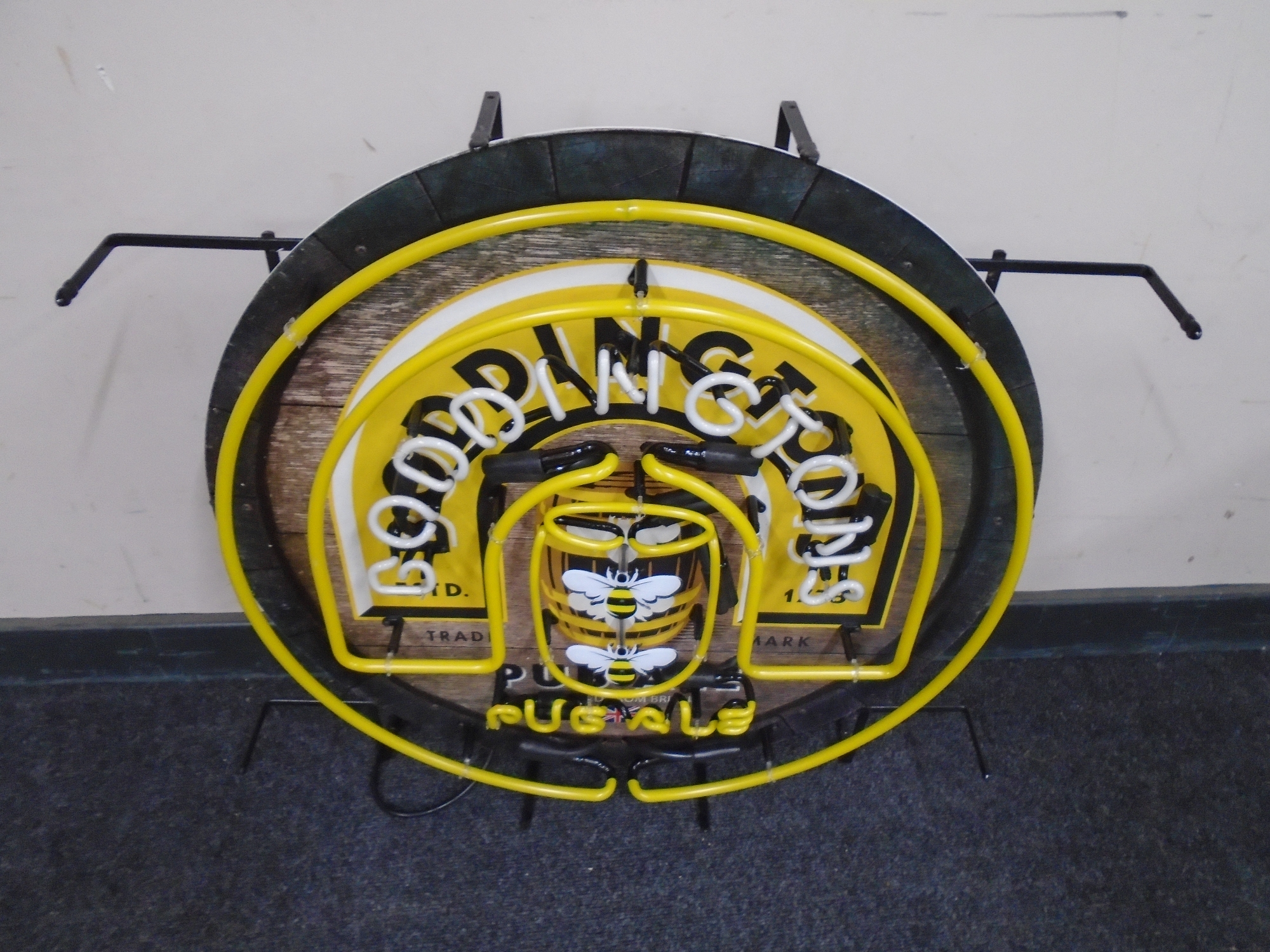 A Boddingtons illuminated display sign.