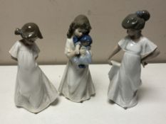 Three Nao figures of girls.