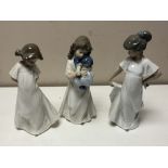 Three Nao figures of girls.