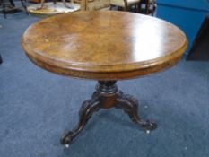 A Victorian burr walnut circular pedestal low table, diameter 83 cm, height from top to floor 72 cm.