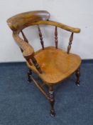 A 19th century elm smoker's armchair CONDITION REPORT: This has been previously