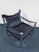 A metal and black leather safari chair.