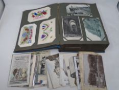 An early 20th century postcard album containing antique and later postcards including World War I