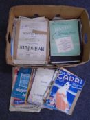 A box of old sheet music.