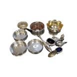 A tray of silver plated wares including bottle coasters, cruet, slender vase etc.