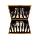 A walnut-cased canteen of EPNS and mother of pearl-handled fish cutlery.
