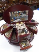 A jewellery casket containing dress rings, costume jewellery etc.