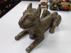 A West African heavy bronze ceremonial cat figure, length 50 cm.