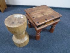 A sheesham wood occasional table and wooden plant stand