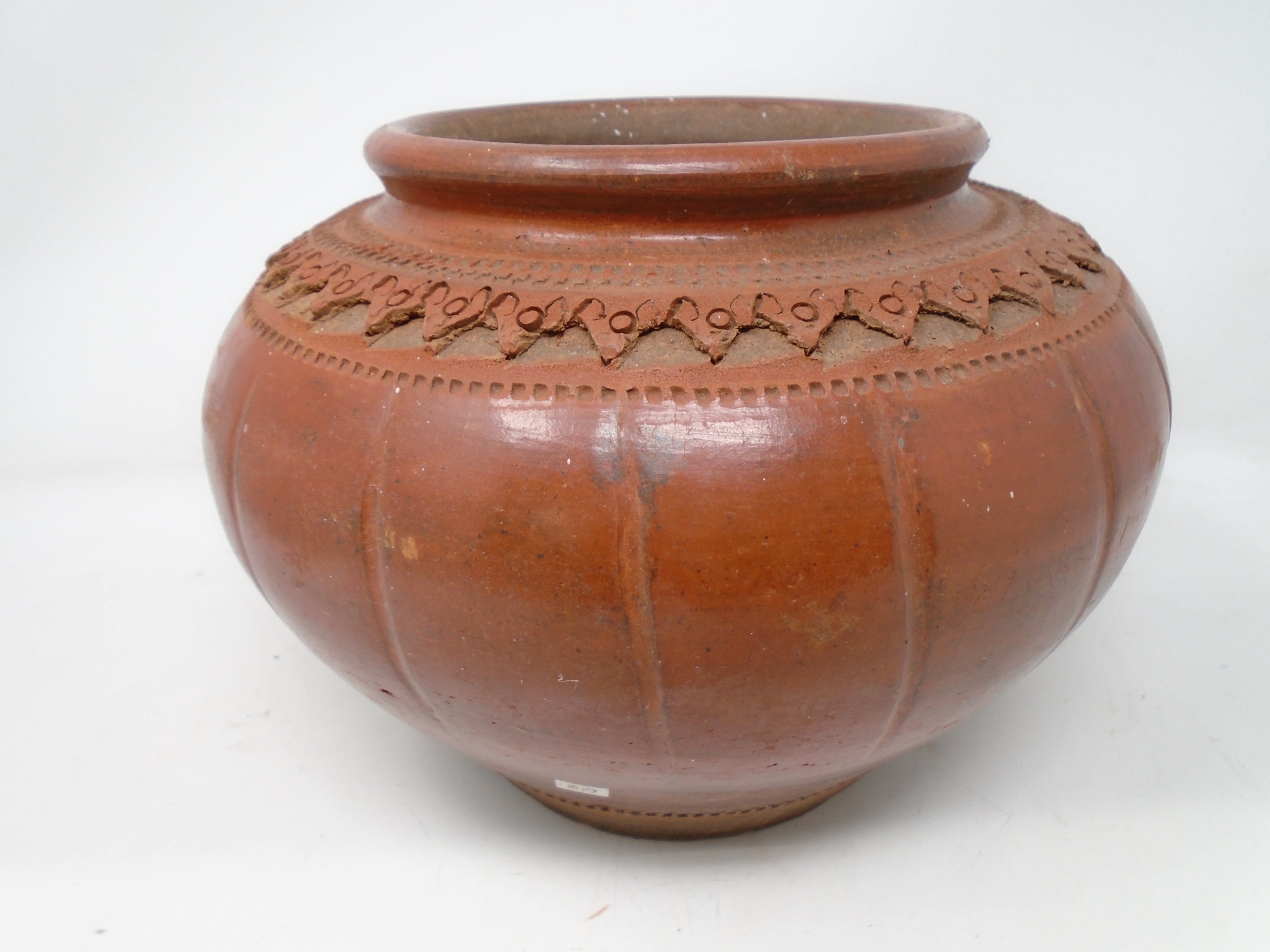 An antique terracotta vase 19 cm x 25 cm