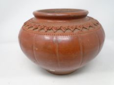 An antique terracotta vase 19 cm x 25 cm