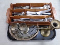 A tray containing a mahogany cutlery tray with plated cutlery, brass candlestick, hand mirror etc.