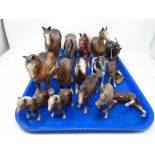 A tray of china horse figures, Beswick donkey etc.