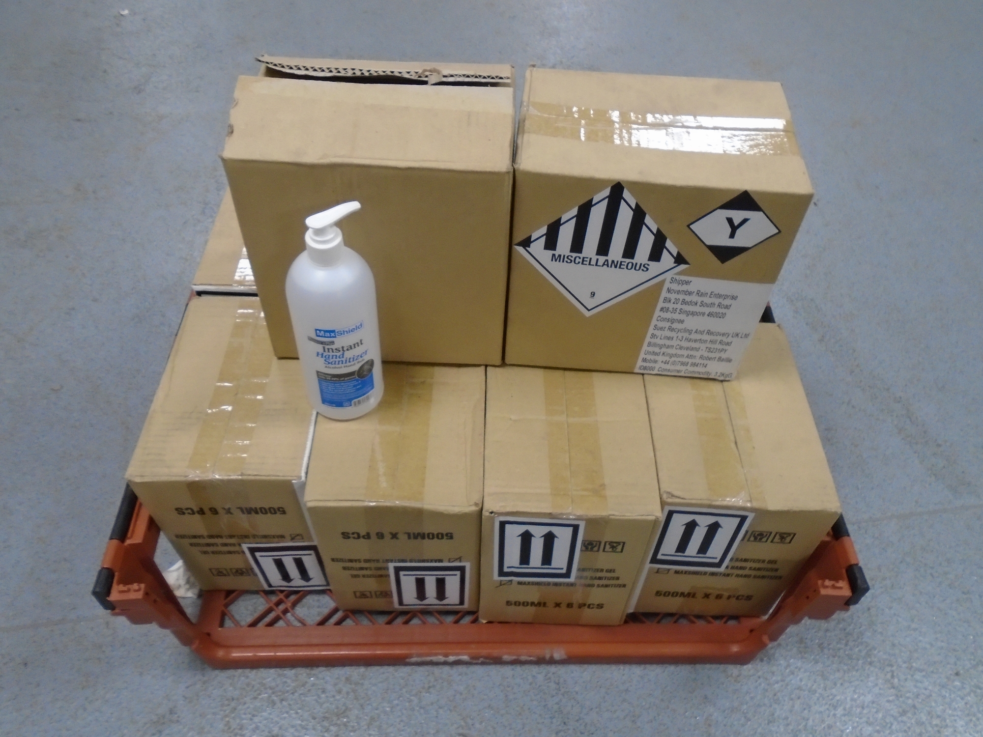 A crate containing 10 boxes of MaxShield hand sanitizer.