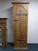 A pine sentry door cabinet.