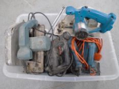 A box containing assorted power tools by Black & Decker and Makita.