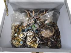 A box of costume jewellery, beads,