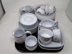 A tray of Denby fine stoneware coffee and dinnerware.
