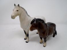 Two Beswick figures of a Shetland pony and a Grey Horse.