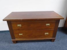 An antique mahogany two drawer chest.