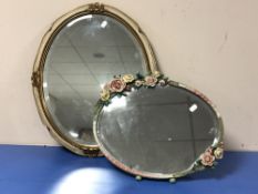 A Barbola dressing table mirror together with a cream and gilt framed oval mirror.