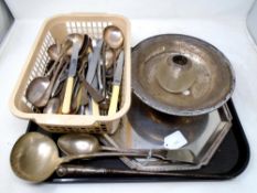 A tray of silver plated cutlery, a large ladle, a glass match striker with silver mount etc.
