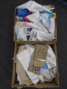Two boxes containing assorted 20th century linen.
