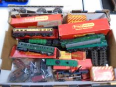 A box containing a quantity of Hornby railway items including locomotive engines, track,