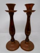 Two pairs of early 20th century candlesticks.