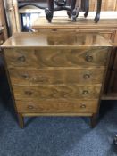 A Scandinavian mid-20th century four drawer chest.