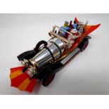 A Corgi Toys Chitty Chitty Bang Bang die cast vehicle with figures.