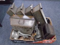 A box containing vintage kitchenalia including cake and loaf tins, vintage mincers etc.