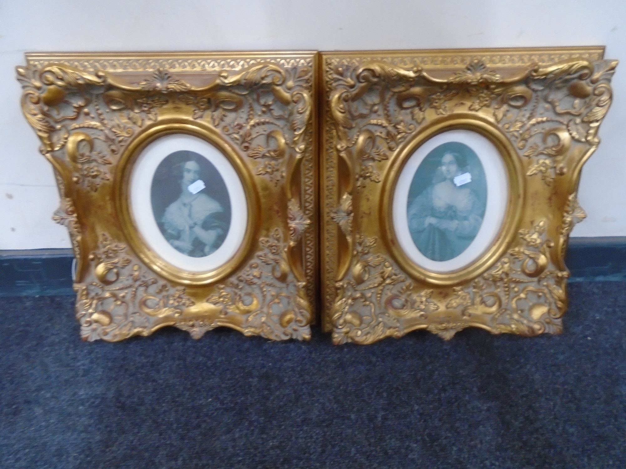 A pair of Victorian style gilt framed prints, portrait studies.