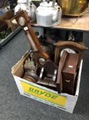 A box containing an antique inlaid mahogany barometer,