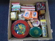 A box of old tins, Railway Riot game by Universal publications, vintage games,
