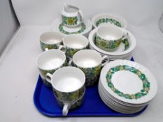 A tray of Spanish floral coffee and dinner ware