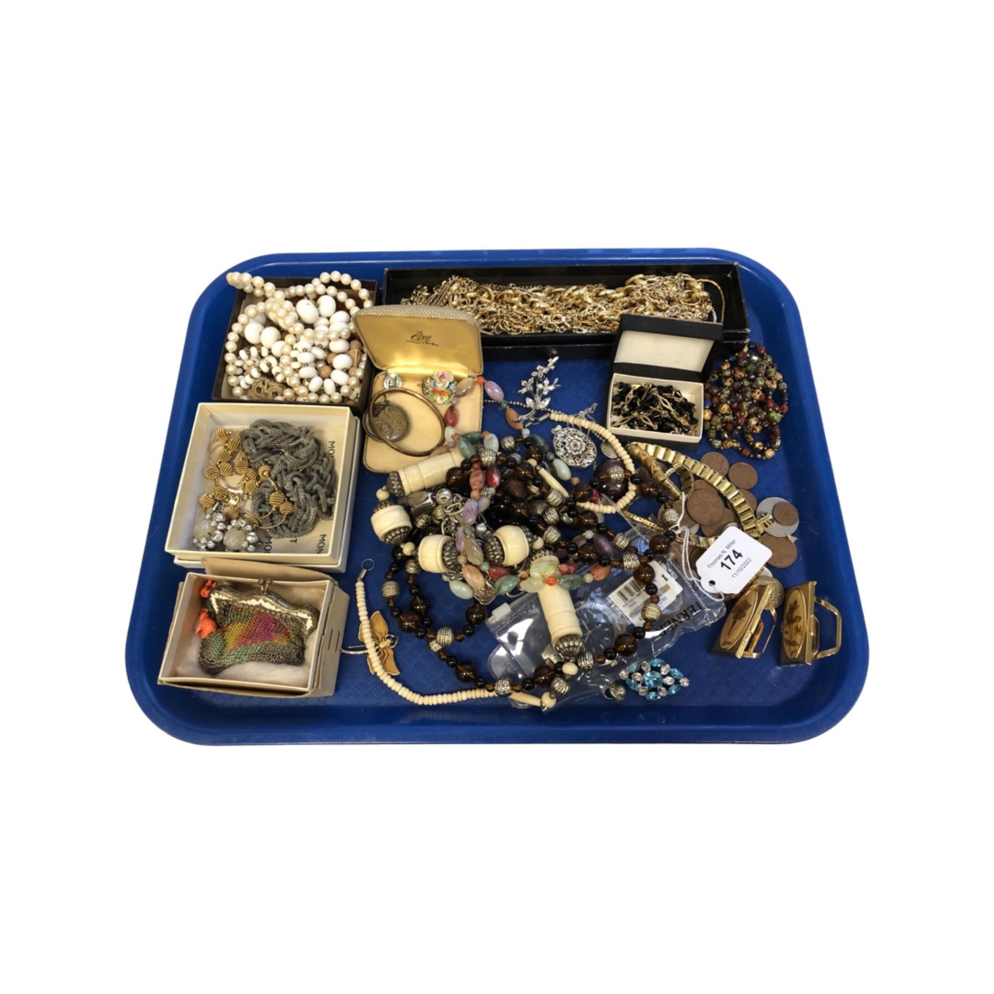 A tray of costume jewellery, coins, ornate silver locket etc.