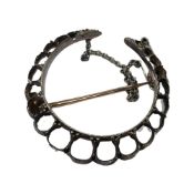 An antique crescent brooch frame, lacking stones, in yellow and white metal, diameter 35mm.