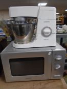 A Kenwood chef classic food mixer together with a microwave.